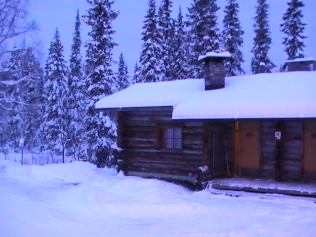 Log cabin in Luosto in the snow